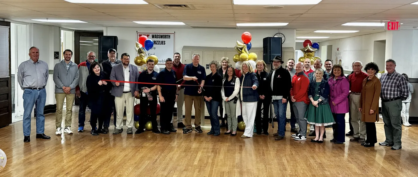 Members gathered for a Chamber ribbon cutting